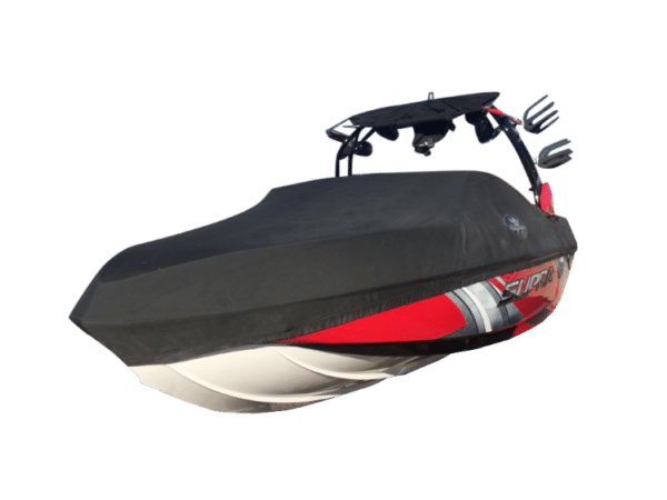 A covered red and black wakeboard boat with a tower and rack accessories on a plain white background.