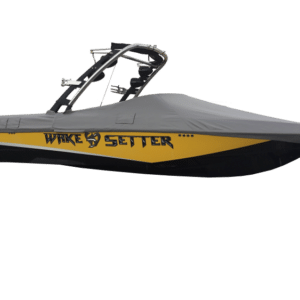 A covered yellow and black Wake Setter boat with a metal wakeboard tower, displayed on a white background.